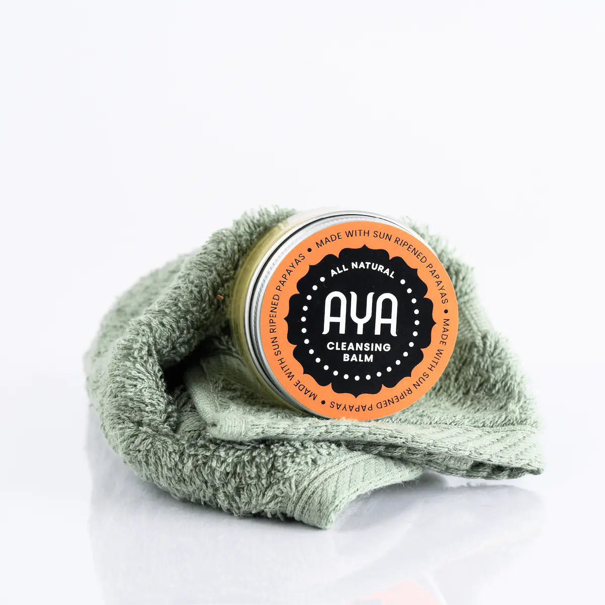 AYA Cleansing Balm all natural lid close up with face cloth