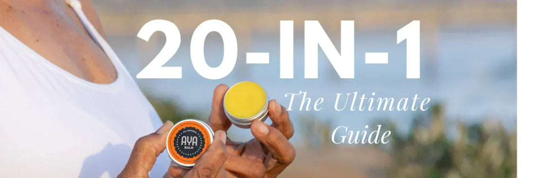 Close-up of a woman's hands holding an open tin of yellow AYA Balm against a soft, blurred natural background. The text on the left reads '20-IN-1: The Ultimate Guide' in bold and elegant typography