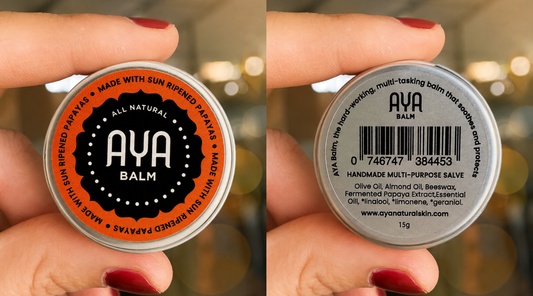 YA Balm tin showing front label and back ingredient list including fermented papaya extract, beeswax and olive oil — natural multi-purpose balm made in South Africa