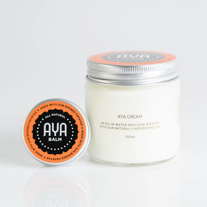 AYA Cream 100ml oil-in-water emulsion jar with AYA Balm all natural sun ripened papaya tin side view