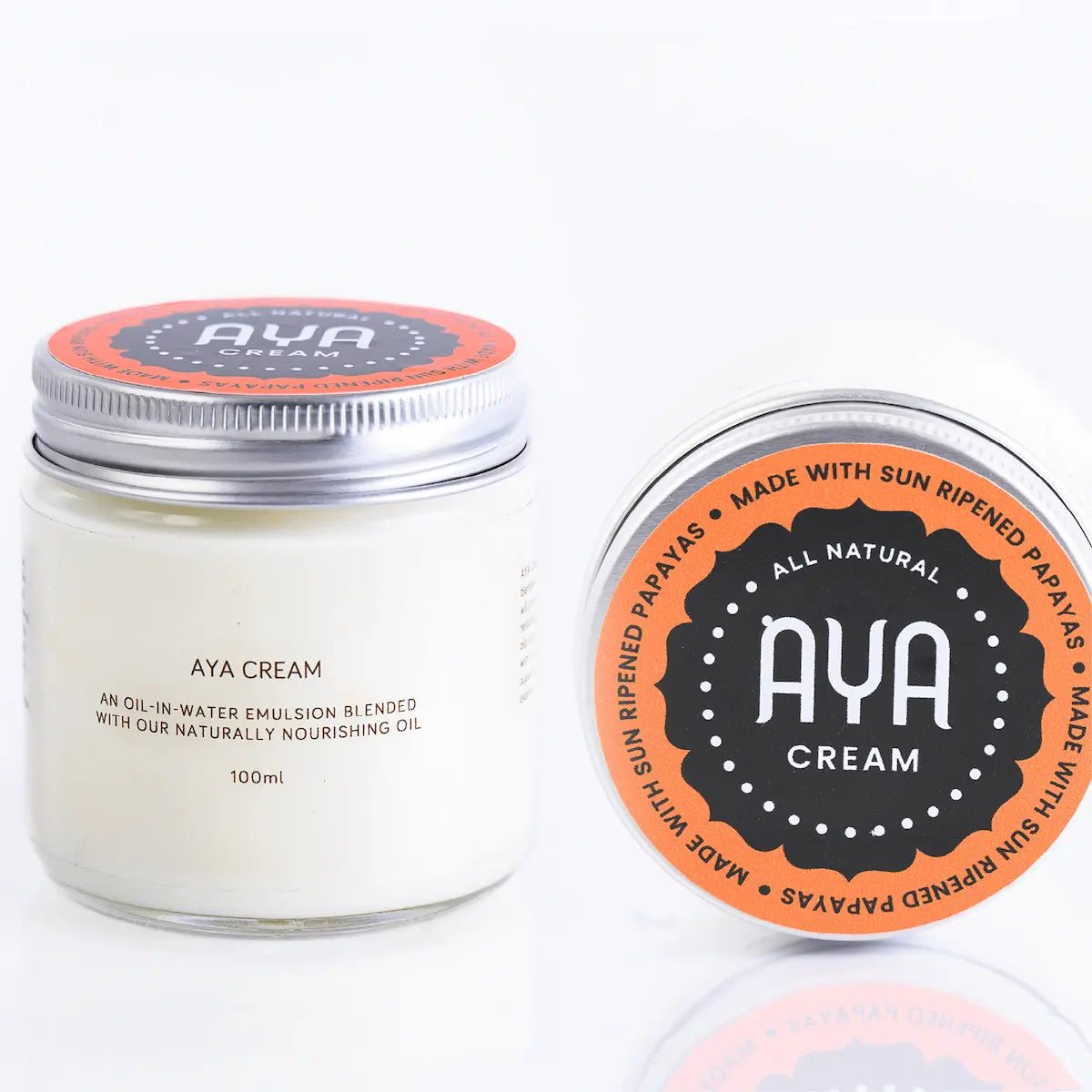 AYA Cream 100ml glass jar with lid showing all natural sun ripened papaya ingredients